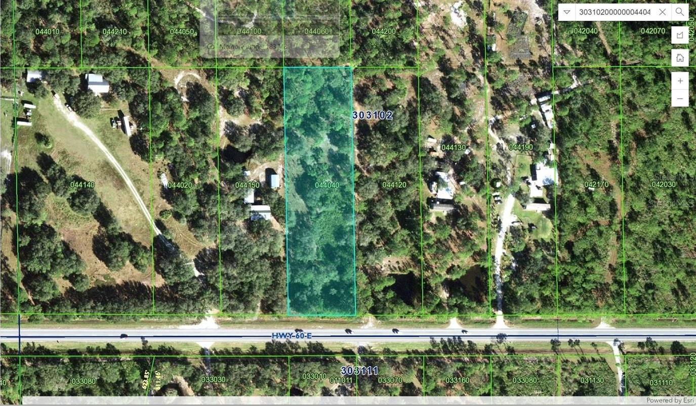 Build your dream home or invest in the future with this rare opportunity to own 2.32 acres of residential, uncleared land in rapidly growing Polk County. Located just off Highway 60 with direct access, this property offers the perfect blend of privacy and convenience. Zoned for residential use, the land is high and dry with utilities nearby—ready to be connected when a home is built or placed on the property. Enjoy the freedom of no HOA or deed restrictions (buyer to verify with county), and the flexibility to create a custom residence, place a modular home, or hold as a long-term investment. With ample space for a home, garden, workshop, or additional structures, this parcel provides endless potential in a peaceful, yet connected location. Situated just a short drive from River Ranch Resort, you'll have quick access to one of Florida’s most popular destinations for outdoor recreation, camping, and off-road adventure. Don’t miss out—properties with this kind of location and versatility are hard to come by.