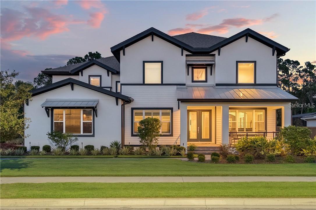 This masterfully crafted estate is the epitome of luxury Florida living. Nestled on a sprawling 1/2-acre lot, behind the gates of the Preserve subdivision, this masterpiece offers over $700K in upgrades & panoramic conservation views from its private backyard. This spectacular residence will captivate you at every turn with its 5 beds, 6.5 baths, office, media room, 3-car garage & 8500+ SF of exquisitely appointed indoor & outdoor spaces. The first floor is graced by a soaring 20’ high grand foyer, wide plank engineered wood flooring, coffered ceiling, office, formal living, dining & family rooms. You will notice the moment you walk in the foyer & see the 20’ ceilings & some of the 40k of window treatments hand designed by an amazing interior designer for this elegant stunning executive home. You will love the beautiful wainscoting on the lower level. Your chef inspired kitchen features a massive center island accented with waterfall edge Viaterra Calcutta counter, double stacked custom cabinetry with glass doors, professional grade Monogram appliances including top of the line gas range, built-in fridge, beverage center fridge & French door built-in oven to unleash your inner chef! The breathtaking master bedroom exhibits its own luxurious allure with a lovely sitting area, a dazzling all-white master spa with garden tub, walk-in shower & massive walk-in closet with built-ins. The beautiful fireplace added in the downstairs family room is so inviting to sit around with your family and friends & is absolutely stunning with the extra built-in cabinets. The 2nd floor hosts 4 beautiful beds, 4 baths (3 en-suites) & a superb loft with direct access to the spacious balcony that takes full advantage of the unparalleled conservation views. Outside, you can experience the best in Florida living in your own private oasis enriched by a sparkling, Hampton style, 34-foot-long, pebble finish, heated saltwater pool framed in 2800+ SF of paved decking. The newly added retractable screens are a wonderful addition to enjoying the outdoor space year-round. You don’t want to miss the 30k outdoor kitchen which is a perfect addition for all your outdoor entertainment of your friends and family. Of course, the front and back landscaping was updated for amazing curb appeal. You have to see the large 7 X 10 beautifully designed Mudroom with benches to sit on to take off or put on your shoes, and cabinets for storage. The current owners had SunPower installed solar panels capable of generating at least 21kW of electricity, enough to power the entire home & capacity to charge two electric vehicles. (Plenty of room in garage to install 2 charging stations as well.) The new buyers will be thrilled with this amazing upgrade and the buyers won't have to worry about high electric bills ever again! Located in a booming Medical City! Embrace the exceptional lifestyle offered by Laureate Park, which is Lake Nona's premier community which includes an array of top-notch amenities residents can enjoy. Immerse yourself in the refreshing waters of the aquatic center, stay active at the fitness center, tennis courts, high speed fiber optic internet. Canvas restaurant, playgrounds, miles of walking, running & biking, as well as community gardens and pocket parks throughout the neighborhood. Convenience is further enhanced by the home's proximity to excellent schools, premier shopping & dining destinations. Make your appointment to view the stunning estate home today!