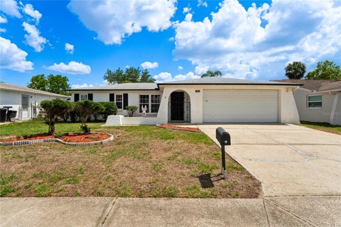 Photo of 7234 Lincoln Park Ln, Port Richey, FL 34667 (MLS # W7885735)