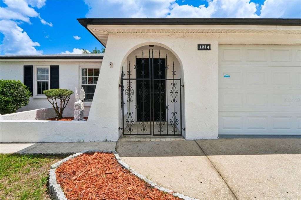 Photo of 7234 Lincoln Park Ln, Port Richey, FL 34667 (MLS # W7885735)