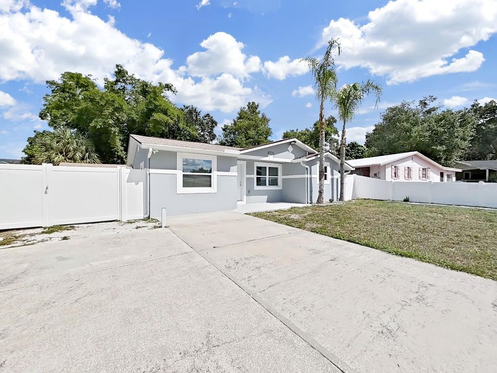Photo of 8721 N River Forest Circle, Tampa, FL 33604 (MLS # TB8436401)
