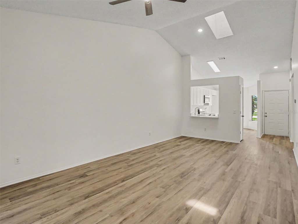 Photo of 84 Lakepointe Circle, Kissimmee, FL 34743 (MLS # O6435248)