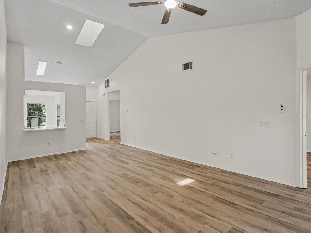 Photo of 84 Lakepointe Circle, Kissimmee, FL 34743 (MLS # O6435248)