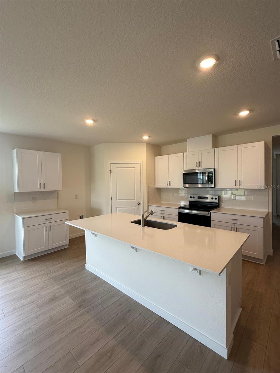 Photo of 876 Britton Loop, Saint Cloud, FL 34771 (MLS # O6409461)