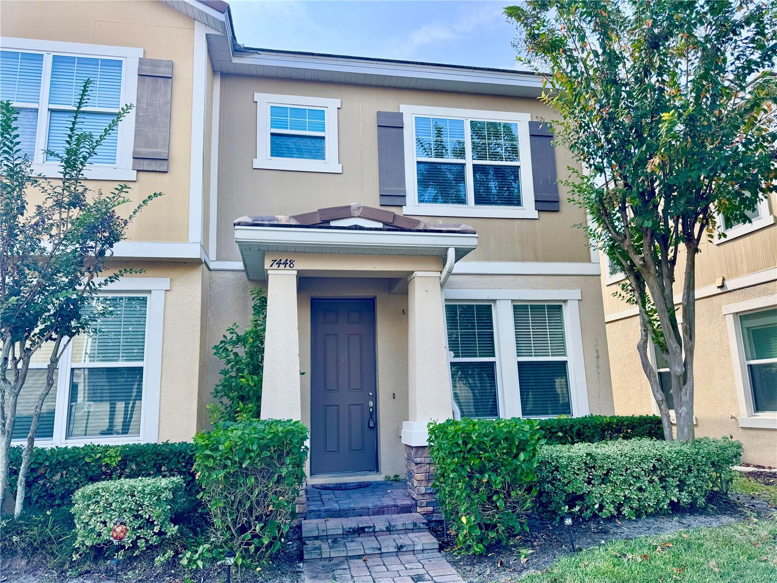 Live in one of Windermere’s most desirable communities! This beautifully maintained 3-bedroom, 2.5-bath townhome offers a spacious open-concept layout perfect for comfortable living. The kitchen features granite countertops, stainless steel appliances, 42” solid wood cabinets, and a generous amount of storage. The first floor offers ceramic tile throughout, while all bedrooms are located upstairs with cozy carpet and a conveniently placed laundry room. The primary suite includes a walk-in closet and private bathroom, with two additional bedrooms offering natural light and ample closet space. French doors lead to a private courtyard ideal for relaxing or outdoor dining, which connects to the detached two-car garage. Located in the highly sought-after Lake Burden community, residents enjoy resort-style amenities including a pool, tennis courts, playground, walking trails, and scenic lake views. Just minutes from Disney, top-rated schools, Hamlin Town Center, shopping, dining, and major highways. Experience comfort and lifestyle in the heart of Windermere!