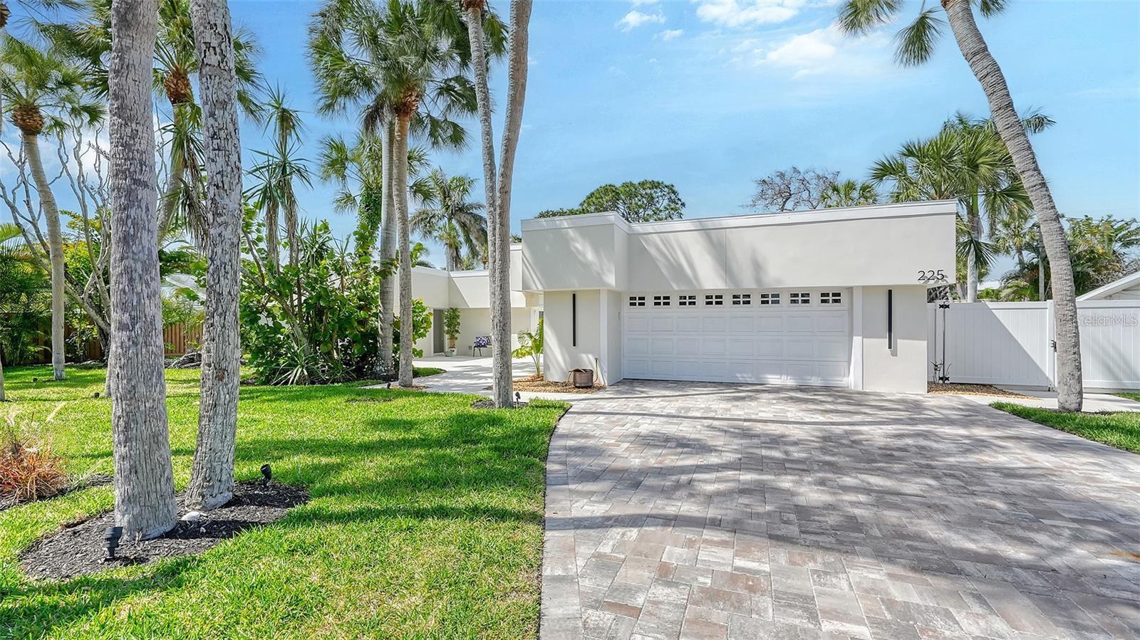 Under contract-accepting backup offers. FIXER UPPER OPPORTUNITY – REMEDIATION COMPLETE! Rarely available on St. Armands, this 4BR/3BA pool home offers a fresh start with demo and storm damage remediation fully completed, ready for your final touches. This home features a modern parapet facade, new roof, and a private courtyard entrance. Inside, enjoy a sun-filled split floor plan with volume ceilings, an oversized great room, and a spacious eat-in kitchen with pass-through window to outdoor dining by the courtyard pool.
The private backyard oasis boasts a saltwater pool, an expansive pool deck surrounded by landscaping and a privacy fence—perfect for Florida entertaining.
Just minutes to Lido Beach, steps to St. Armands Circle, and right over the Ringling Bridge to Downtown Sarasota—this is a rare chance to own on the Circle with the major work completed. Just come in and customize the finishing touches and enjoy the ultimate Sarasota lifestyle!