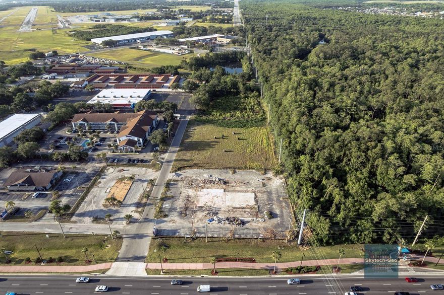 This property in Kissimmee, located on the south side of US Highway 192, offers a prime opportunity for development. With 4.53 acres of land and a zoning classification of highway commercial with mixed-use (MUV), the site is flexible for various types of businesses and developments. The future land use (FLU) designation aligns with urban-scale neighborhoods and villages, offering opportunities for a wide range of uses including hotels, multi-family residential units, commercial restaurants, retail spaces, and potentially storage units The existing stormwater management pond at the rear of the plot could provide practical benefits for development, potentially reducing some of the infrastructure costs related to water management. Key highlights include: High traffic count of 60,000 vehicles, making it a highly visible and accessible location. Situated within the Vine Street Corridor, which promotes walking, biking, and sustainable transportation options. Future land use encourages mixed-use developments and connectivity to major focal points and downtown Kissimmee, enhancing the property's appeal for various urban development projects. This property seems well-positioned for a wide range of development opportunities, from commercial ventures to residential and mixed-use projects. It’s ideal for investors or developers looking to capitalize on Kissimmee's growth, especially with the area's focus on urban-scale, sustainable development. Being next to Shingle Creek Regional Park, 456-acres, includes several old homes from the historic Shingle Creek community. The park includes fishing, hiking trails, picnicking, play area, and restrooms. Stefee Landing has a launch onto the Designated Paddling Trail, outfitter, boardwalk and bridge. The Shingle Creek Regional Trail runs through the park, when complete it will run 32 miles from Kissimmee to Wekiwa Springs State Park in Seminole County. Will add a versatile and a vibrant energy to any project you choose