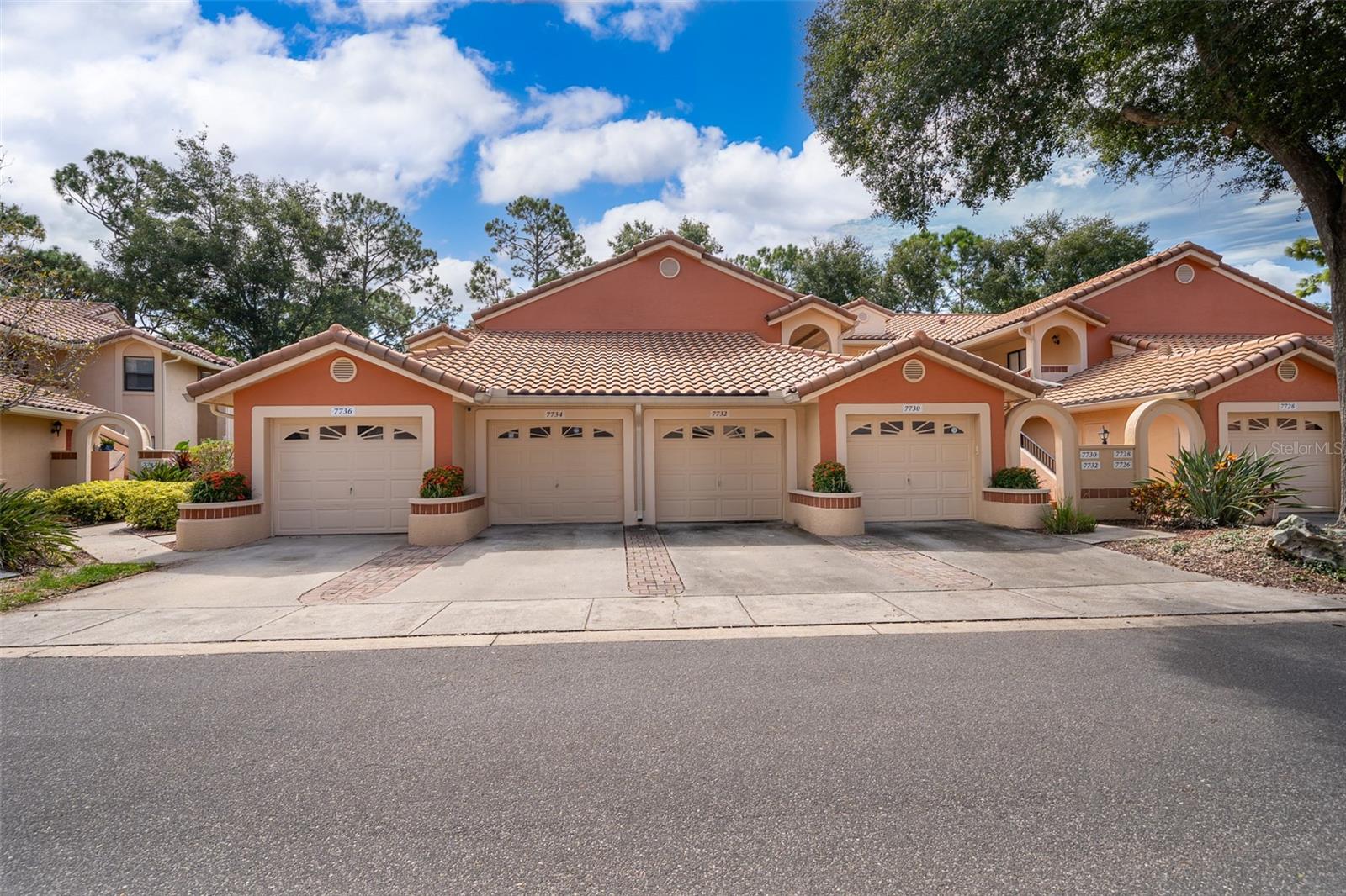 Welcome to 7734 Sugar Bend Dr, Located in the heart of Dr. Phillips in the sought-after Sanctuary at Bay Hill. This beautifully upgraded 3-bedroom, 2-bathroom ground-floor condo updated kitchen and bathrooms with granite counter tops, stainless steel appliances, freshly painted interior and new laminate floors throughout the unit. This amazing unit offers the perfect blend of comfort and convenience, complete with a screened patio for relaxing Florida evenings and one car garage for extra space.Tile Roof was replaced in 2023, giving peace of mind for years to come. Community Amenities: Nestled in a gated community, residents enjoy access to a resort-style pool, clubhouse, fitness center, lighted tennis and basketball courts, and a playground—perfect for an active lifestyle or entertaining guests. Prime Location: Positioned just off Sand Lake Road, YMCA, shopping, fine dining, and top-rated entertainment. Enjoy easy access to major roadways, the Intl. airport and downtown Orlando and a short drive to Orlando’s world-renowned theme parks, making this location ideal for both full-time residents and seasonal owners. Don't miss out on this incredible opportunity, call now and make your showing appointment.