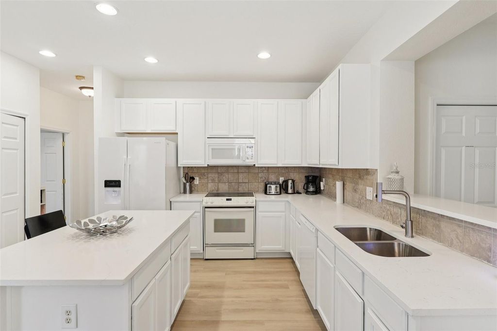 Photo of 334 Orange Cosmos Boulevard, Davenport, FL 33837 (MLS # O6427193)