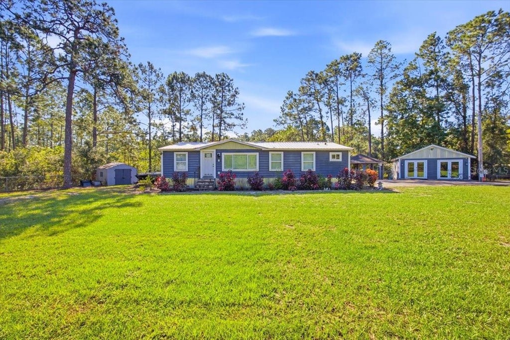 Photo of 107 Deer Run Drive, Davenport, FL 33837 (MLS # O6449298)
