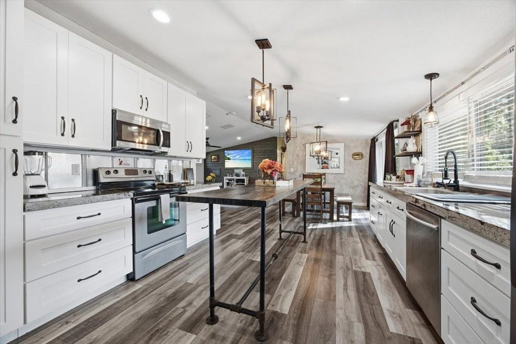 Photo of 107 Deer Run Drive, Davenport, FL 33837 (MLS # O6449298)