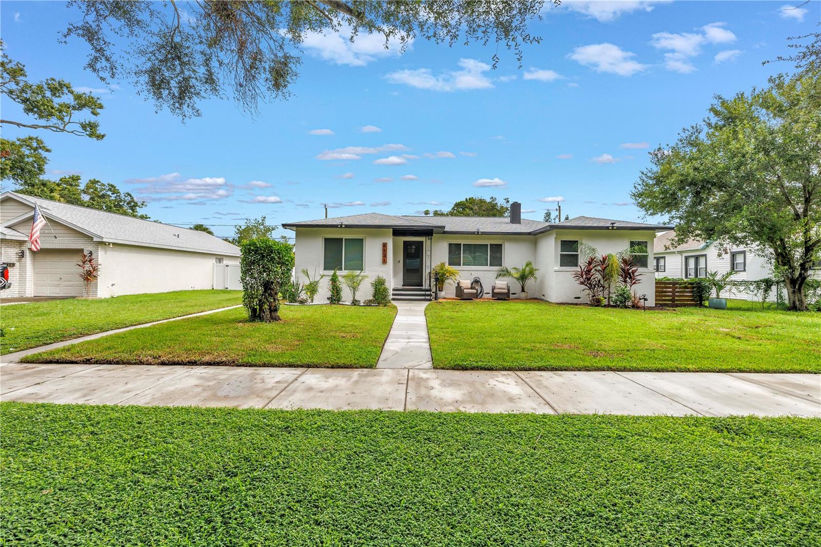 One or more photo(s) has been virtually staged. SINGLE-FAMILY RESIDENCE WITH A DETACHED ACCESSORY DWELLING UNIT FEATURING SEPARATE UTILITIES AND DEDICATED PARKING A PRESERVED MID-CENTURY RARITY IN CENTRAL OAK PARK
Welcome to this preserved mid-century rarity — a true 1950s architectural gem located in the highly sought-after Central Oak Park neighborhood. Just 10 minutes from vibrant Downtown St. Pete and 12 minutes from the white sands of the Gulf beaches, this property offers not one, but two fully modernized homes on a generously sized 75 x 125 lot.
The owners are perfectionists and have maintained this home with integrity and care, preserving its timeless charm while tastefully upgrading every major system for today’s lifestyle.
The main residence offers 4 bedrooms and 2 bathrooms across 1,508 sq ft of heated space and showcases authentic mid-century character throughout. Step inside to experience the stunning original 2¼" x ¾" solid oak hardwood floors, professionally sanded, stained, and finished with three coats of urethane — restored to an impeccable, like-new condition. Architectural highlights include graceful cove ceilings and true plaster walls, all freshly painted with a professional touch. The kitchen was fully renovated in 2023, featuring new cabinets, countertops, and appliances that balance modern functionality with classic design.
At the rear of the property, you’ll find a detached 1-bedroom, 1-bathroom ADU (576 sq ft heated) — a completely separate living space with its own entrance, private parking, separate utilities, and a 1-car garage. Currently leased for $1,570/month, the ADU offers built-in passive income or a perfect option for extended family, guests, or a private office.
The following work has been completed on both properties.
Impact windows (2023)
Professionally painted interiors (2023)
Newer roofs (2022)
Newer AC systems and condensers (2022–2023)
Removed old insulation and blown-in attic insulation (2023)
165 feet of underground Orangeburg pipe replaced with PVC (2023)
Outdoors, enjoy a beautifully fenced-in yard ideal for pets, a cozy covered back porch for unwinding, updated landscaping, new wood fencing, exterior lighting, and a new concrete driveway that adds even more curb appeal.
This property is a rare opportunity to own a true mid-century treasure — modernized with precision and preserved with pride. Whether you’re searching for income potential, a dual-living solution, or a one-of-a-kind home that celebrates craftsmanship, this Central Oak Park gem is a must-see.
Private showings available by appointment — don't miss your chance to own this standout St. Pete property.