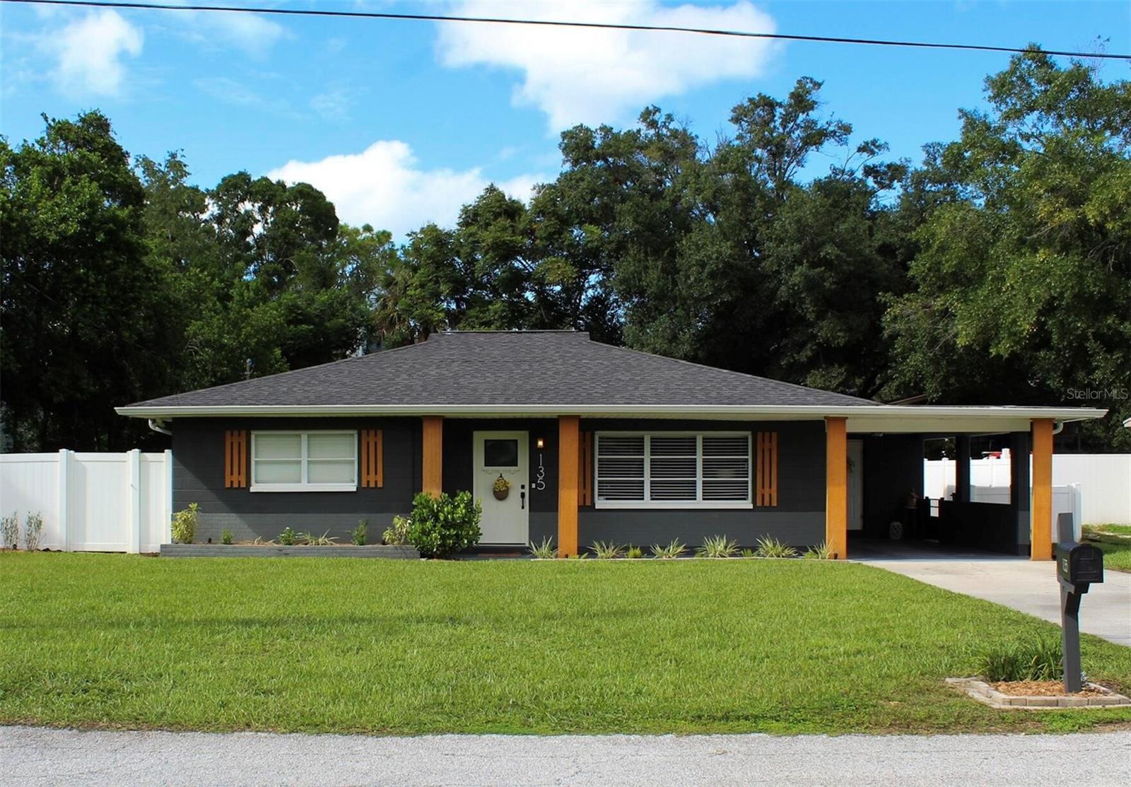 Welcome to 135 Connie Avenue! This fantastic block home offers three bedrooms with two full bathrooms, a family room, separate dining room and an updated kitchen with soft shut white cabinetry, granite countertops and stainless steel appliances. The kitchen offers counter eating area and opens up to the large family room. The home is truly move-in ready, all bedrooms are great size and the primary bedroom is very spacious featuring two custom California built-in closets. A new hot water heater was installed in 2024, New AC unit and roof as of 2016 The lot is exceptionally large offering over 0.27 acres and is fully fenced in with vinyl 6 ½ foot privacy fence with gate access on both sides. The Backyard offers a large paver patio area with a custom built-in pergola for enjoyment and entertainment. The backyard also offers a raised garden bed for those wanting to start their home gardening journey! The shed in the backyard measures 12x16 is insulated with built in shelves, a window A/C unit, & outlets for a work space. The home is positioned at the end of the street with A naturalized lot on the west side. This charming property has been meticulously cared for, with regular upkeep including fresh paint (iron ore by Sherwin-Williams), serviced HVAC, pressure washed exterior, cleaned gutters and custom landscaping throughout the property. Located in a quiet neighborhood, there are NO HOA or CDD fees, and you have easy access to I-275, shopping, dining and entertainment, Moffitt Cancer Center, Advent Health Hospital and USF campus are only 15 minutes away. Don’t miss this opportunity to own this updated, move-in-ready home in a sought-after location with no community restrictions.