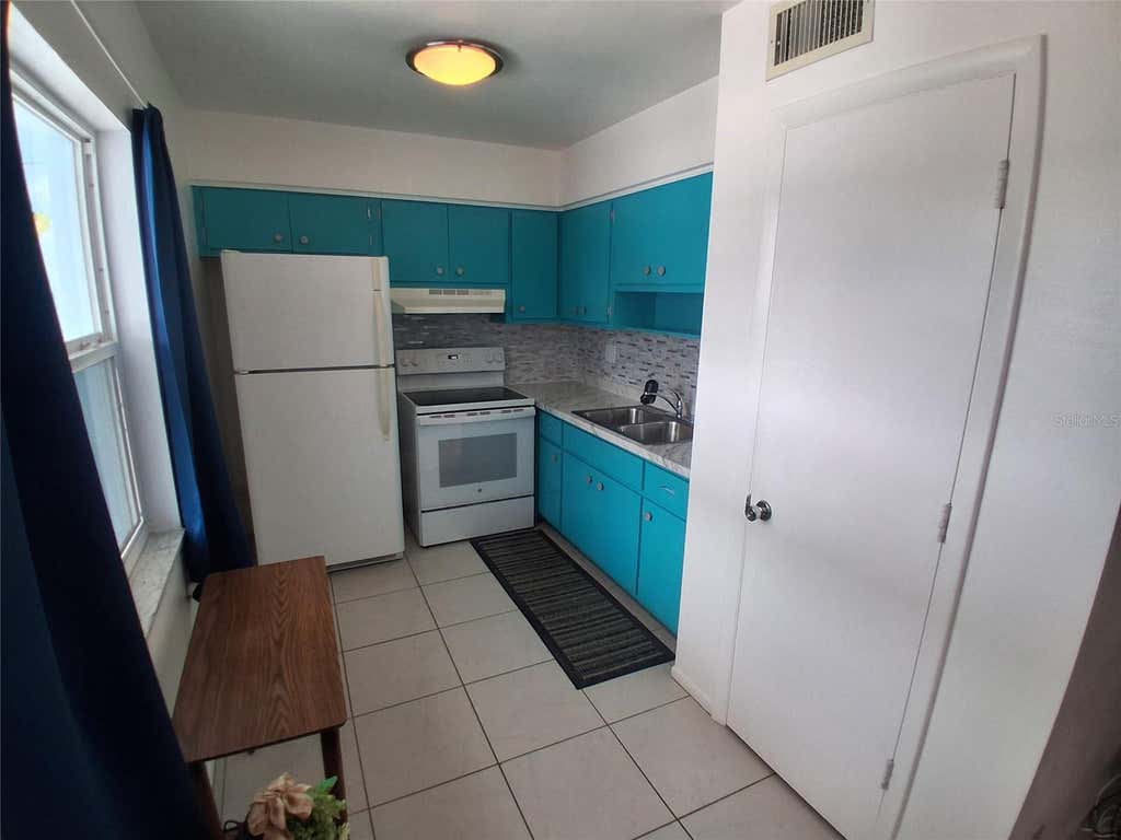 Photo of 125 Portree Drive, Dunedin, FL 34698 (MLS # TB8529769)