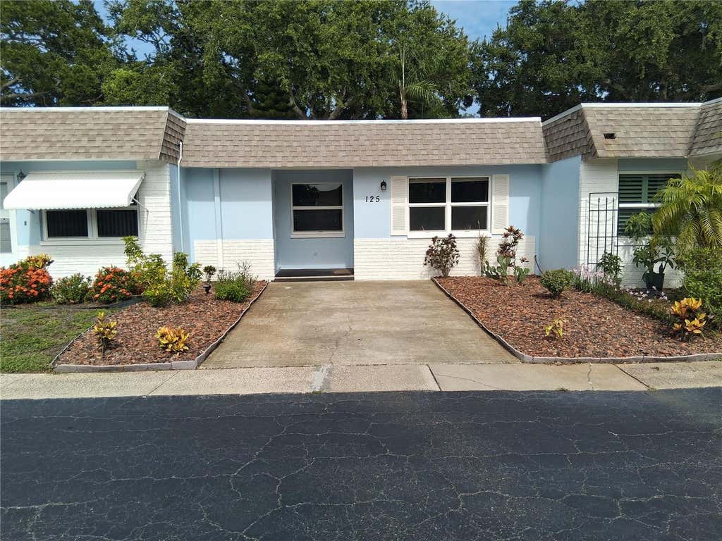 Photo of 125 Portree Drive, Dunedin, FL 34698 (MLS # TB8529769)