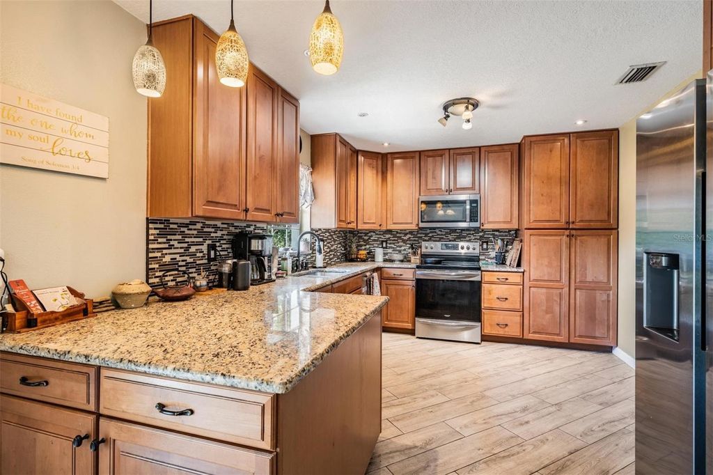 Photo of 7631 Pinehurst Drive, Spring Hill, FL 34606 (MLS # TB8434906)