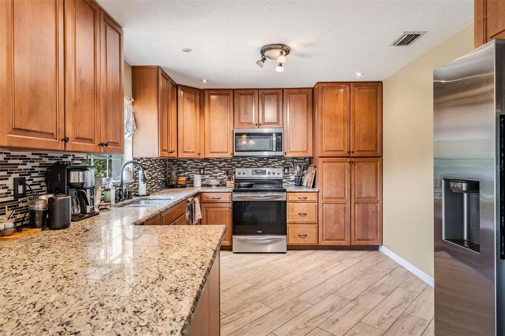 Photo of 7631 Pinehurst Drive, Spring Hill, FL 34606 (MLS # TB8434906)