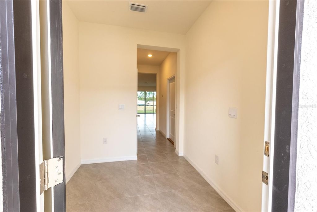 Photo of 33027 Tulip Petal Lane, Wesley Chapel, FL 33545 (MLS # TB8462584)