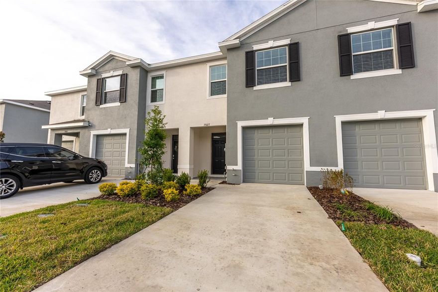 Step into this beautiful two-story townhome in Avalon Park, Wesley Chapel, FL. With 3 bedrooms, 2.5 bathrooms, and a one-car garage, this home is crafted with block-on-block construction for enhanced energy efficiency and durability. The open floor plan welcomes you with sliding glass doors in the living area, creating a seamless connection to the outdoors.
The kitchen features a large granite island, ample counter space, cabinet storage, a walk-in pantry, and state-of-the-art stainless steel appliances. Upstairs, discover the 3 bedrooms, washer and dryer, with the primary bedroom offering dual walk-in closets and a jack-and-Jill style bathroom with a standing shower. Enjoy community living with a range of amenities, including pools, a playground, parks, a dog park, trails, walkways, a basketball court, and clubhouses. Conveniently located near I-75, this townhome provides easy access to downtown Tampa and other major cities. The highly rated Pasco County school district adds to the appeal, and a forthcoming town center in close proximity. Just 7 miles to KRATE at The Grove and within 8 miles to Tampa Premium Outlets and The Shops at Wiregrass. Welcome home to contemporary comfort and style. HOA requires $50 application fee. Renters Insurance required.