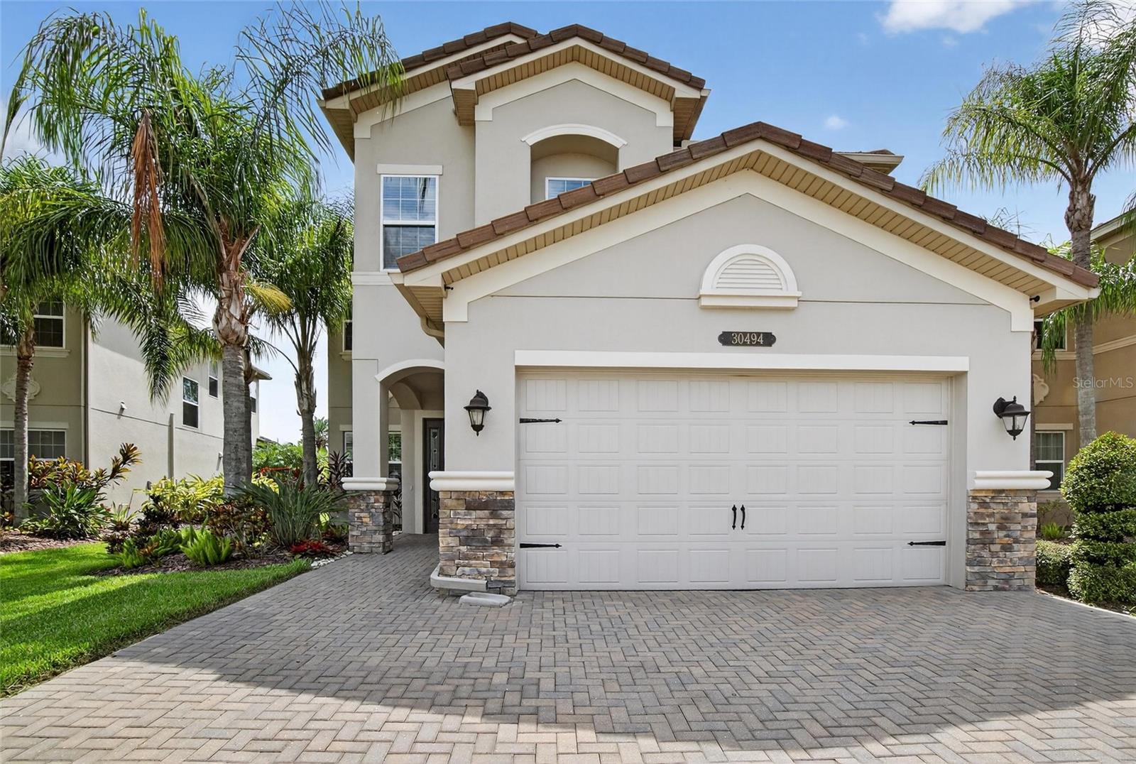 Welcome to The Ridge at Wiregrass, a premier manned guard-gated community in Wesley Chapel offering resort-style amenities and a stress-free lifestyle with lawn care included.
This beautifully maintained home is privately positioned on a quiet cul-de-sac with serene conservation views and no rear neighbors. Inside, the open-concept layout features a gourmet kitchen with custom cabinetry, marble countertops, a natural gas range, and both a dinette and formal dining area. The living room opens seamlessly to an extended screened lanai with panoramic screens, perfect for relaxing or entertaining.
Additional features include a two-car garage with extended driveway, a new high-end washer and dryer, and a hidden storage closet beneath the staircase. Every detail has been designed for comfort and convenience.
As a resident, you’ll enjoy access to world-class amenities: a fitness center, lap pool, resort-style pool with waterslide, splash pad, playgrounds, tennis and basketball courts, and a clubhouse for private events. Zoned for top-rated schools and just minutes from Wiregrass Mall, The Grove, KRATE, Tampa Premium Outlets, and major highways, this home combines privacy, luxury, and convenience in one of Wesley Chapel’s most sought-after communities.