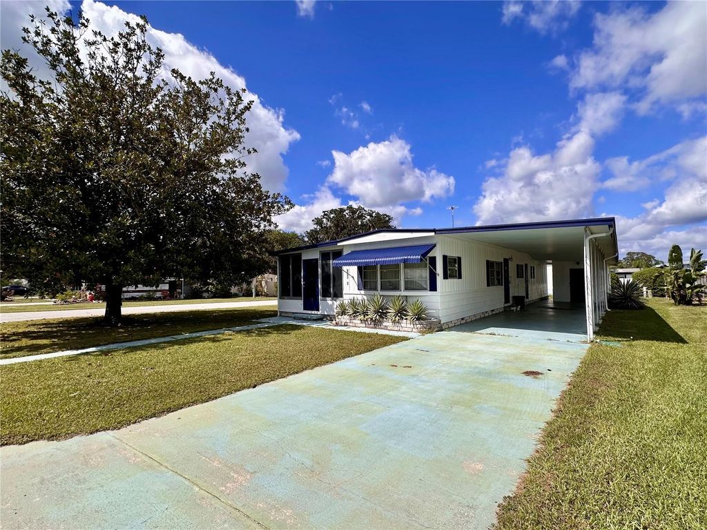 Photo of 37925 Date Palm Drive, Zephyrhills, FL 33542 (MLS # OM710602)