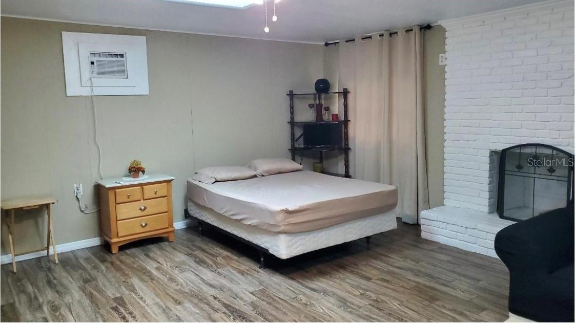 AVAILBLE 10/1/2025-Private Cozy Studio efficiency for rent! Features remodeled full bath (shower), kitchenette with full size Refrigerator. Located minutes away from AdventHealth East, Valencia Community College and UCF. Utilities (electric and water) are included in the rental amount. Studio comes partially furnished. Call today for a tour this studio won't last long.