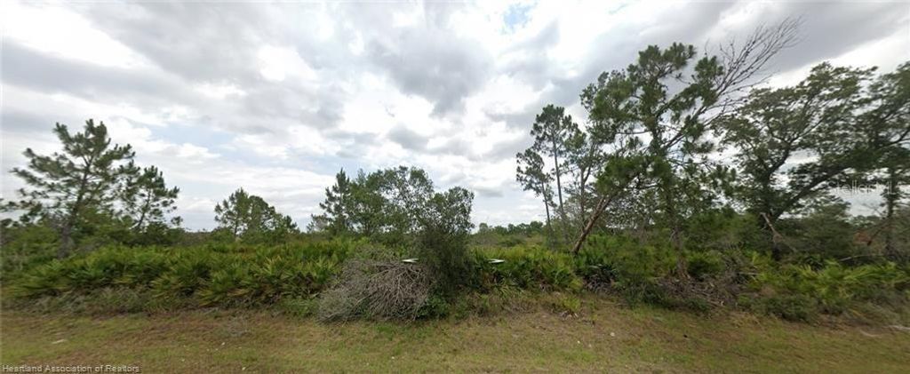 Photo of 6020 Virtudes Street, Sebring, FL 33872 (MLS # L4959424)