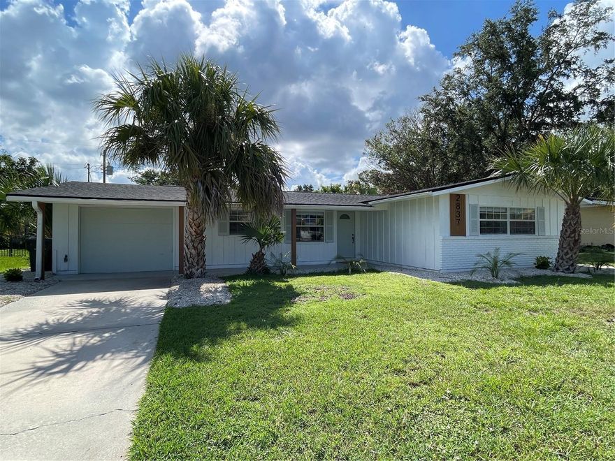 This beautiful fully renovated home is listed well UNDER appraised value! Text your agent and have them add the home with the 1960's Concrete Fallout Shelter / Hurricane Bunker to this weekends home tour.

Welcome to 2837 Woodcrest Drive, where form meets function in a fully reimagined modern ranch just minutes from the heart of Sarasota. This isn’t just a remodel. It’s a statement, with no detail overlooked and no expense spared. Every system has been upgraded. 2025 Roof, HVAC updated 2021, LED lighting, windows, and more.

Step inside and you’re greeted by an open-concept design that flows from the oversized living area to a showstopper kitchen built for those who love to cook, entertain, or simply be surrounded by beautiful things. We're talking two-tone cabinetry, sleek quartz countertops, brand-new stainless appliances, and clean sightlines that connect every inch of your living space.

This home offers three large bedrooms, two designer-renovated bathrooms with upscale finishes, and a layout that’s been meticulously tailored for comfort and style. This is turn-key, high-impact, and low-maintenance.

Now let’s talk about the real flex. A concrete storm shelter that’s not just rare, it's borderline unheard of. Whether you want safety, storage, or a private vault for your collectibles, this space delivers next-level peace of mind.

Outside, the vibe continues. A brand-new fence surrounds your private backyard oasis, complete with a screened patio perfect for evening cocktails, Sunday BBQs, or just soaking in the Florida sun.

This is more than a home. It's a lifestyle move. And it's ready for you.