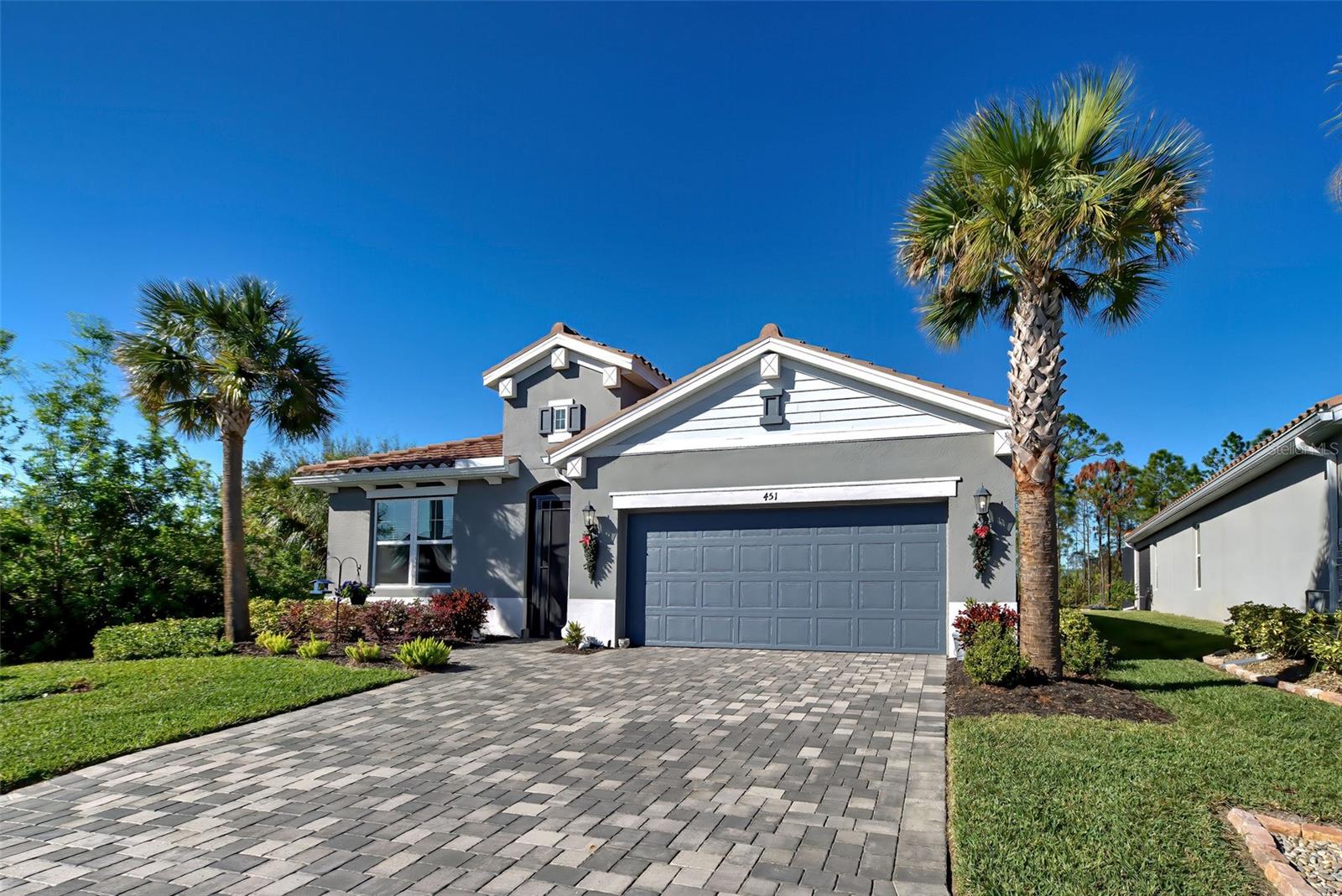 Brand New Home-Sweet-Home, built in 2022, located in Sarasota County’s unincorporated town of Nokomis – a coastal charm of the "Old Florida" lifestyle, beautiful waterways, pristine beaches such as Nokomis Beach and North Jetty Beach; close to kayaking, canoeing, ranches, trails, aquariums, dining, shopping, and cultural attractions of Venice and Sarasota: Myakka River Park, The Ringling & Old Betsy Museums, just to name a few.
Your Future Home-Sweet-Home Is Packed With Several Beneficial Features:
•NO FLOOD ZONE X – Attached to this listing is FEMA’s Flood Zone Determination Letter dated July 3, 2025, Elevation Certificate, Survey & Floorplan.
•Some of the many features you will appreciate: New CONCRETE TILE BARREL ROOF, HURRICANE IMPACT WINDOWS AND DOORS, New Water Heater, New HVAC, 9Ft Ceilings, 8Ft Interior Doors, Granite Countertops, Ceramic Tile floors, and Tall Baseboards.
•Your striking Glass Main Door opens to a spacious Foyer and Hallway designed for privacy.
•Large Living Room includes a Ceiling Fan and ready with cable outlets to complete your entertainment area.
•Bring your culinary skills to your future Kitchen built with elegance in mind (just like the rest of the home) featuring all Stainless-Steel electrical Appliances: Glass Top Stove with Convection Oven, mounted Microwave, Refrigerator, Dishwasher, Garbage Disposal, as well as 42” Cabinets galore, a large Walk-In Pantry, ample Counterspace, Backsplash, Pendant and Canned Lighting.
•Enjoy that delicious meal in your Dining Room which includes a set of Glass Sliding Doors leading to the backyard.
•Conveniently located INSIDE your future home is the LAUNDRY ROOM housing a full-sized Washer and Dryer that convey with the sale, the Utility Sink, and large Cabinets to match the rest of the home.
•The BONUS ROOM may double as an office or a 4th bedroom as it includes a built-in closet & ceiling fan.
•The large Master Bedroom is carpeted and includes a Ceiling Fan as well as En Suite Bathroom equipped with a Walk-In Closet, Linen Closet, ample Dual Vanity with Granite Countertops, Private Water Closet; and a large tiled Walk-In Shower with an impressive set of Glass Doors.
•Both Guest Bedrooms are spacious, carpeted, and include Ceiling Fans as well as large built-in closets.
•2nd Guest Bathroom includes a ceramic tiled Walk-In Shower, single Granite Countertop Vanity, and beautiful lighting fixtures.
•3rd Guest Bathroom is large and includes a Linen Closet, Bathtub and Shower combination, Dual Vanity with (square-cut) Sinks, Granite Countertops, and beautiful lighting fixtures.
•Enjoy amazing sunsets in your 13x13 covered, screened-in, and Paved Lanai which opens to a charming Paved Patio, offering a private retreat on the rear and south sides of the property, protected by a pristine Natural Preserve.
•Park your car in your future Two Car Garage or in your Paved Driveway.
About the community:
Venice Woodlands is a newly developed ALL-age gated community. There are NO age restrictions in this gated community.
The low monthly HOA fees of just $232 include a variety of amenities designed for an active and enjoyable lifestyle:
•Lawn Maintenance & Irrigation
•Resort-Style Pool
•Clubhouse
•Fitness Center
•Pickleball & Bocce Courts
•Covered Pavilion
**To truly appreciate its beauty, it’s best to see it with your own eyes so schedule your showing today of this fabulous NEW home-sweet-home in a brand NEW community.**
