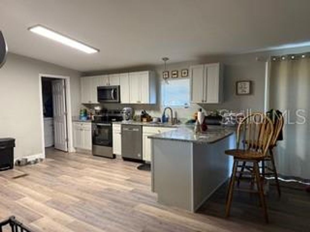 Photo of 3431 Maple Drive, Mulberry, FL 33860 (MLS # TB8466631)