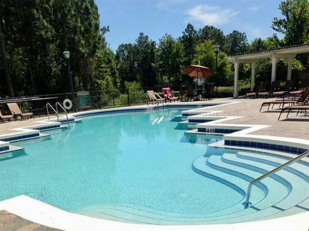 Photo of 737 Crest Pines Drive #613, Orlando, FL 32828 (MLS # O6377841)