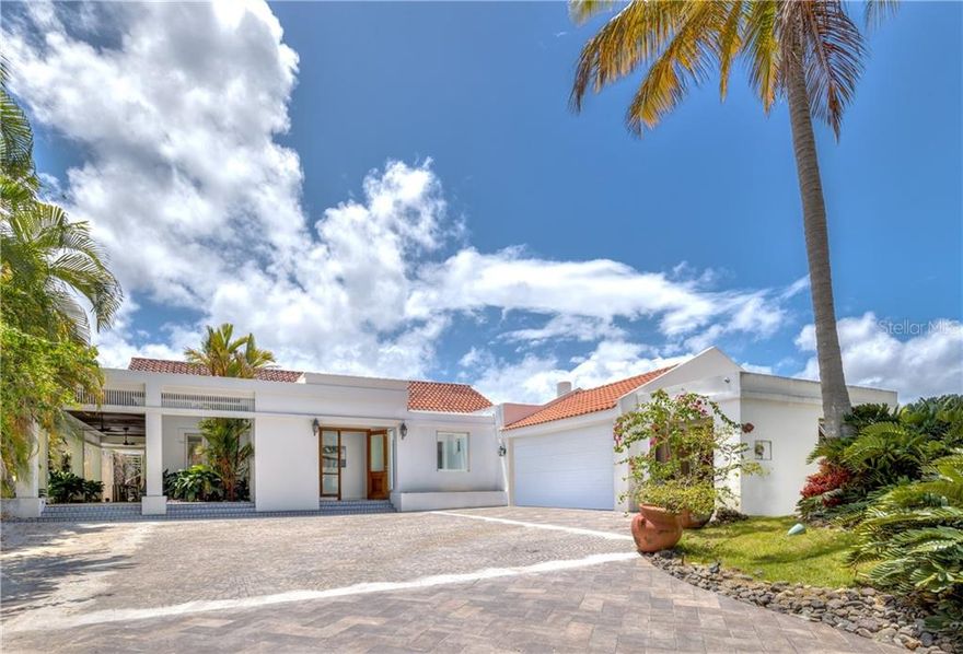 Rare to market Dorado Beach East opportunity.

Single story ranch layout, with construction 85% completed in a beautiful head to toe redesign, with the final work to be carefully selected for the discerning buyer. An infinite amount of tireless detail has gone into the spaces which have been completed, affording the new owners the benefits of short-term details, to complete this truly unique Dorado Beach East home. With just over a quarter acre, 357 Dorado Beach East offers southern exposure on its corner end lot, with mountain views from the rooftop deck, and only three homes off the main golf course and lake.

An elegant grand entry seamlessly draws you into this 5 Bed plus maid's quarters, 6.5 bath spread throughout a gracious 4,000 sq.ft of interior living and 1,500 sq.ft of outdoor dining, entertaining and sunning areas. The meticulously designed master suite located off of the sun filled garden inspired loggia, offers white Spanish marble flooring throughout as well as full marble bath with outdoor tub and shower, Samuel Heath fixtures, walk-in closet and custom mahogany reinforced doors and windows. The adjoining guest bedroom mimics the expression of the master, with full floor to ceiling windows, white marble flooring and mahogany doors, to suit. 

All guest bedrooms feature private ensuite bathrooms and have been fully completed in their renovation, each offering a separate elegance of design, easily appreciated by all who experience the space. The living, dining and kitchen all open out via sliding glass doors which neatly pocket to provide the true benefit of Caribbean living. Seamlessly bringing the outdoors in, the beautiful inground outdoor pool offers a zero, sunset edge, with elevated spa for design impact. Full bar and summer kitchen islet for the incoming new owner to customize to taste, outdoor dining and rooftop terrace facing Southeast. A truly refreshing layout that provides privacy throughout, while maximizing open, entertaining and family spaces.

Very few opportunities such as this present themselves in Dorado Beach East, with the freedom to come and finish work and detail, on this, a definable and one of a kind family home.

Monthly Maintenance Fee: $750.