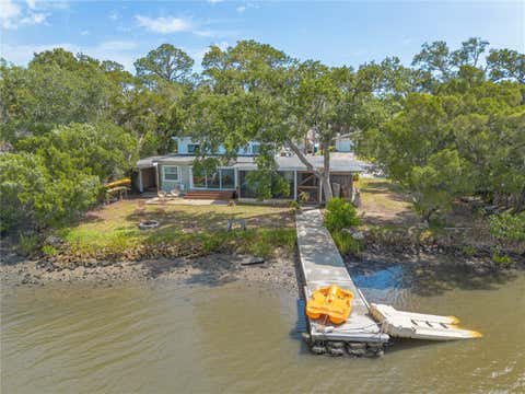 Photo of 5528 W Bayshore Drive, Port Orange, FL 32127 (MLS # NS1088308)