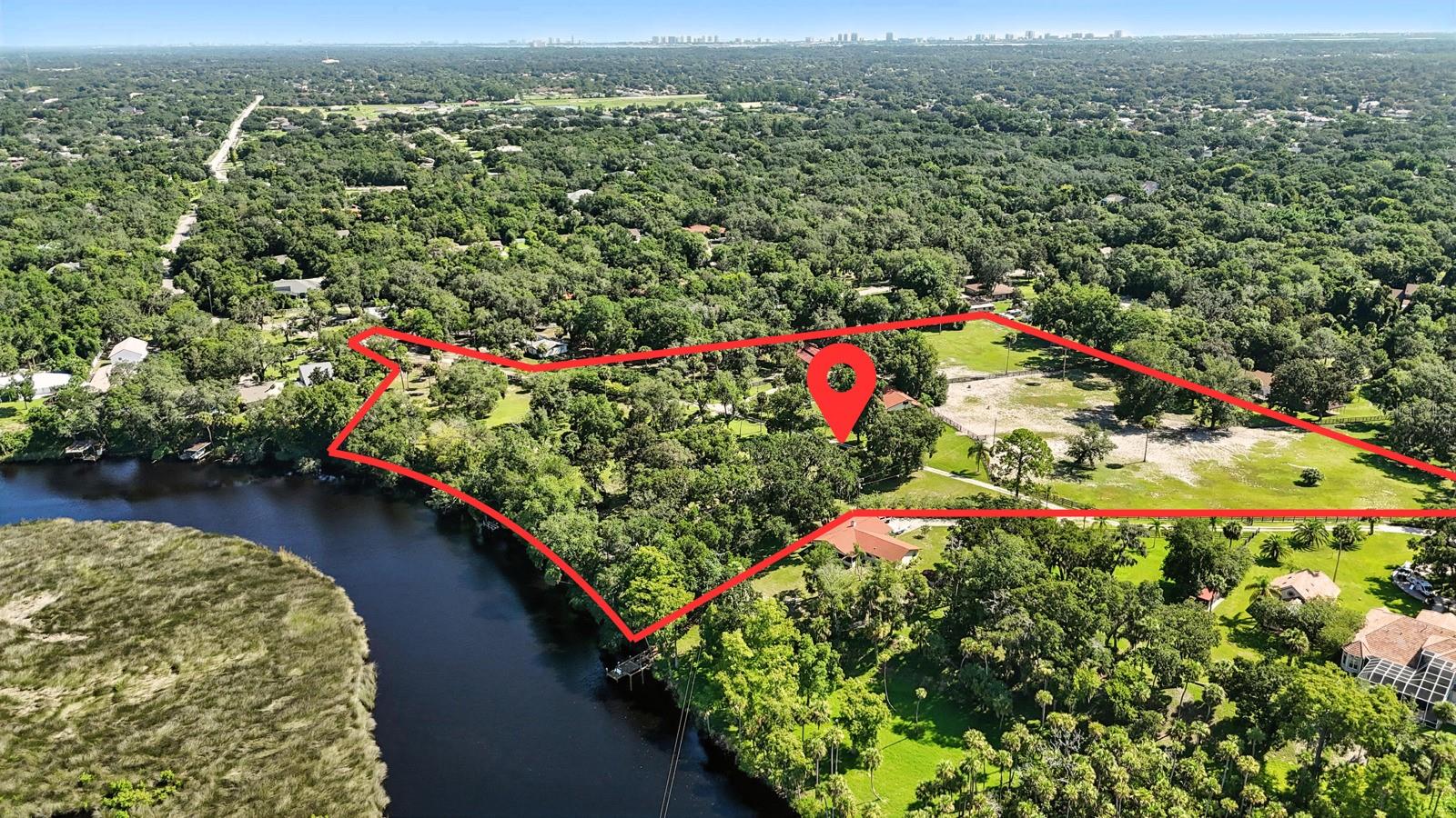 A Rare and Exceptional Riverfront Opportunity on Over 10 Acres
Discover an extraordinary chance to own over 10 acres of prime riverfront property along the picturesque Spruce Creek. This one-of-a-kind estate offers a blend of natural beauty, functional structures, and endless possibilities—making it a standout opportunity in today’s market.
The property includes two large barns: a spacious metal building ideal for equipment or workshop use, and a solid concrete block structure with an upstairs office—perfect for business or hobby space. A charming single-family home also sits on the land and is currently rented, providing immediate income potential.
Whether you're dreaming of building a private estate with stunning water views or exploring development opportunities with the city, this property offers the space and flexibility to bring your vision to life. The entire parcel is fully fenced for privacy and security and includes a private dock with direct access to Spruce Creek—ideal for boating, fishing, or simply enjoying the serene waterfront lifestyle.
Opportunities like this are few and far between. Don’t miss your chance to own a truly special piece of riverfront land.
Please note that all information provided is intended to be accurate, but it is not guaranteed.