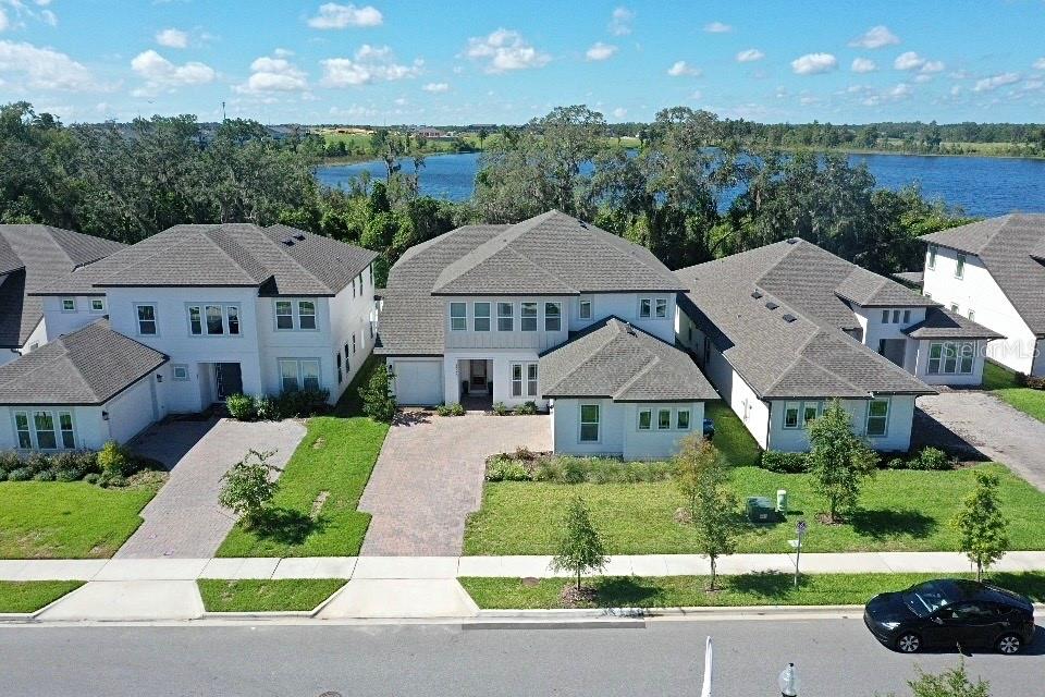 Welcome to this stunning 5-bedroom, 4-bathroom residence located in the highly desirable community of Waterleigh in Winter Garden. With over 3,700 sqft of heated living space and situated on an expansive 1.45-acre lot, this home offers an exceptional blend of luxury, comfort, and functionality.
Step inside to find soaring cathedral ceilings, elegant crown molding, and a thoughtfully designed open floor plan perfect for both entertaining and everyday living. The gourmet kitchen is a chef’s dream, featuring a built-in oven, cooktop, exhaust hood, microwave, dishwasher, and a spacious refrigerator with freezer, all framed by beautiful solid surface counters and ample cabinetry.
The primary suite boasts a generous walk-in closet, tray ceilings, and a spa-like en-suite bathroom. Secondary bedrooms include built-in closets, offering plenty of storage and privacy.
Enjoy indoor-outdoor living with a covered lanai overlooking the vast backyard, ready for a pool, garden, or any personal touch you envision. Additional features include a laundry room, electric water heater, and a 3-car garage.
Located minutes from top-rated schools, dining, shopping, and major roadways, this home combines peaceful suburban living with convenient city access.
Don't miss the opportunity to own one of the largest lots in the neighborhood. Schedule your private tour today.