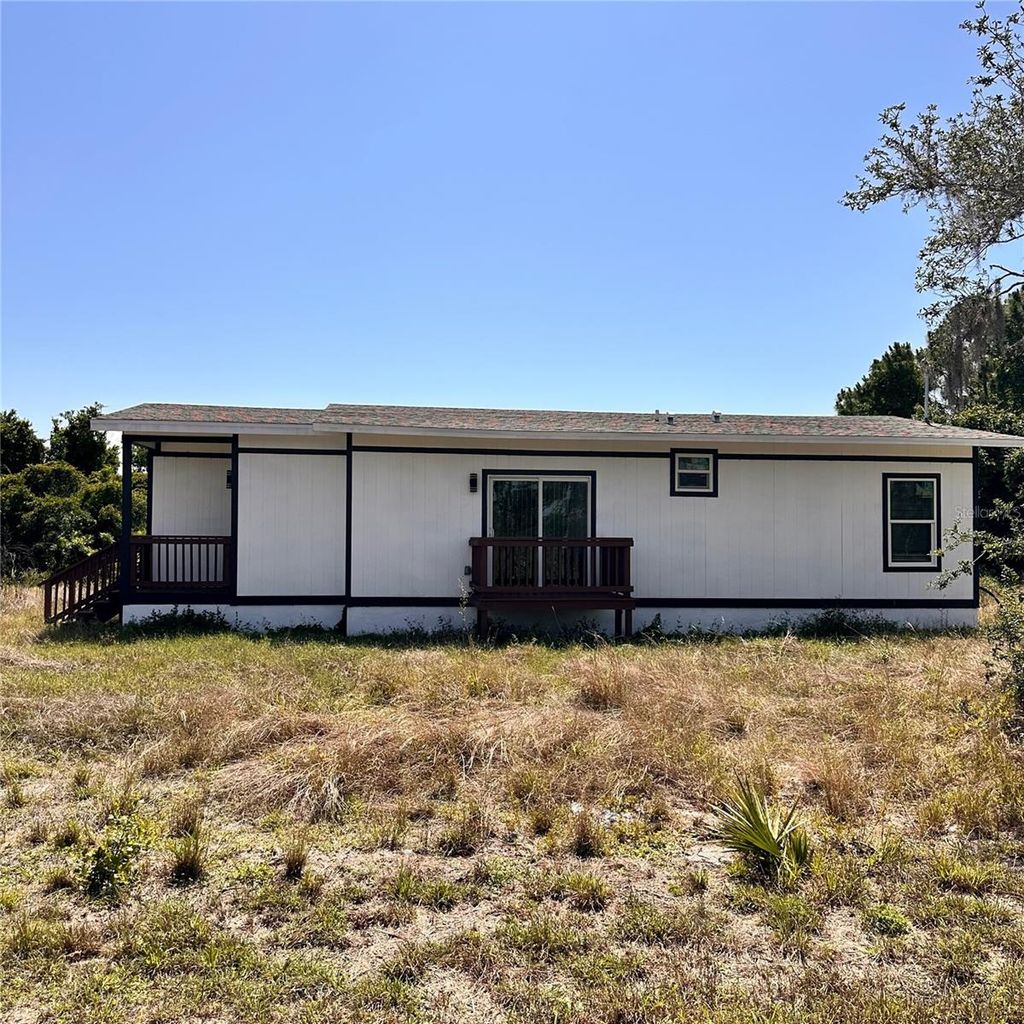 Photo of 601 Highlands Lake Drive, Lake Placid, FL 33852 (MLS # S5126997)
