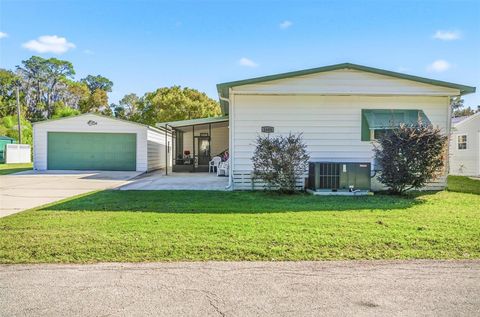 Photo of 1605 Bass Avenue, Seville, FL 32190 (MLS # FC314633)