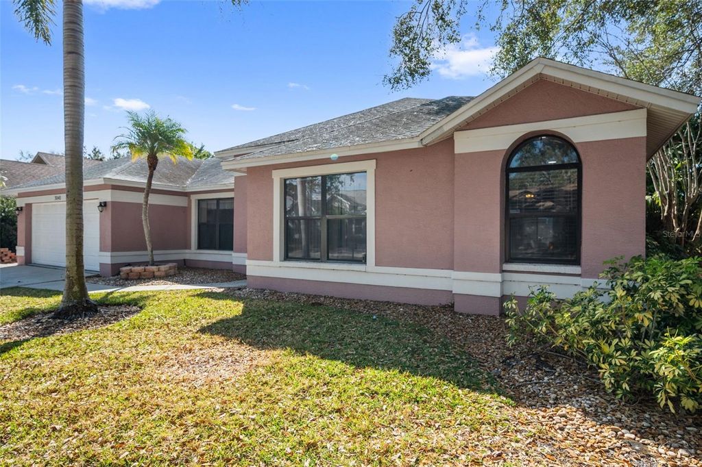 Photo of 3040 Windridge Oaks Drive, Palm Harbor, FL 34684 (MLS # TB8481467)