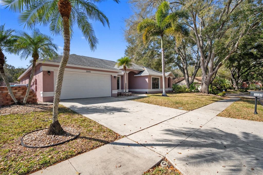Photo of 3040 Windridge Oaks Drive, Palm Harbor, FL 34684 (MLS # TB8481467)