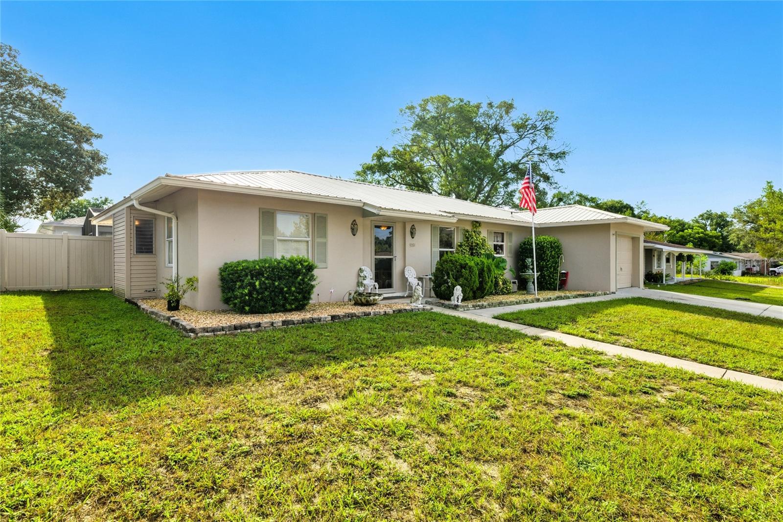 Well-maintained 3BR/2BA Pool home in Citrus Springs with numerous recent upgrades. Features a spacious open living/dining area and functional kitchen with breakfast bar. Metal roof installed in 2022. Pool resurfaced in 2021. Paved walkways added to the front entry and pool area. Fully fenced backyard with 6-ft privacy fence. Exterior and interior electrical panels recently updated to code. HVAC replaced in 2017 with a Goodman 14 SEER 3.5-ton split system. Recently painted inside and outside. Outdoor space includes a beautiful pool and patio area suitable for outdoor activities and entertaining. Located on a low-traffic street with easy access to area amenities including parks, golf, and trails. Ideal for year-round or seasonal living. Come enjoy the Florida lifestyle!