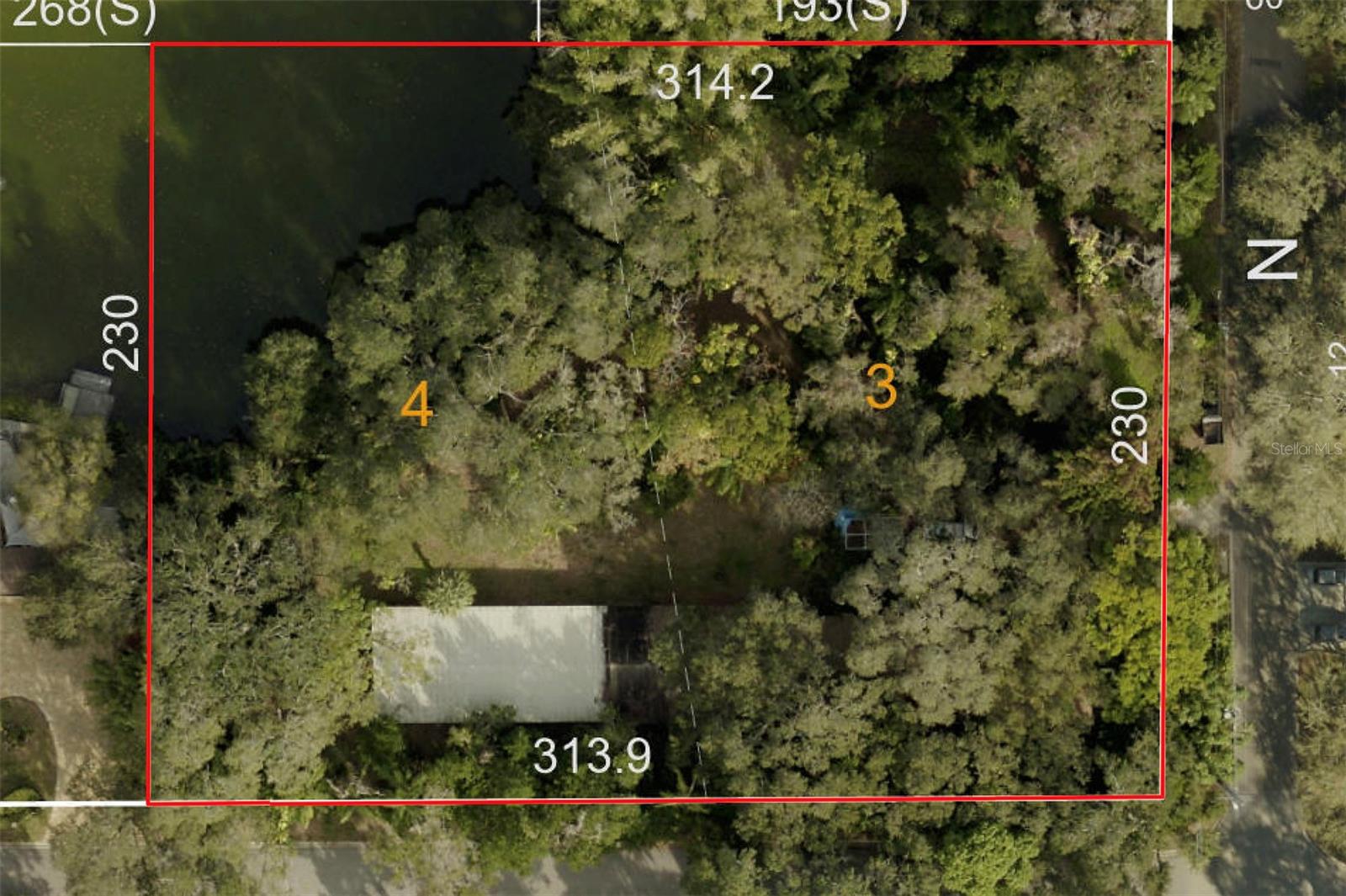 Back on the market! 1.6 acres in the heart of Pinellas County with pond access. No flood insurance required and property can be divided. Seller will not divide, selling both lots together. Lot is wooded and has a small house that will have to be demolished and the remnants of a greenhouse.