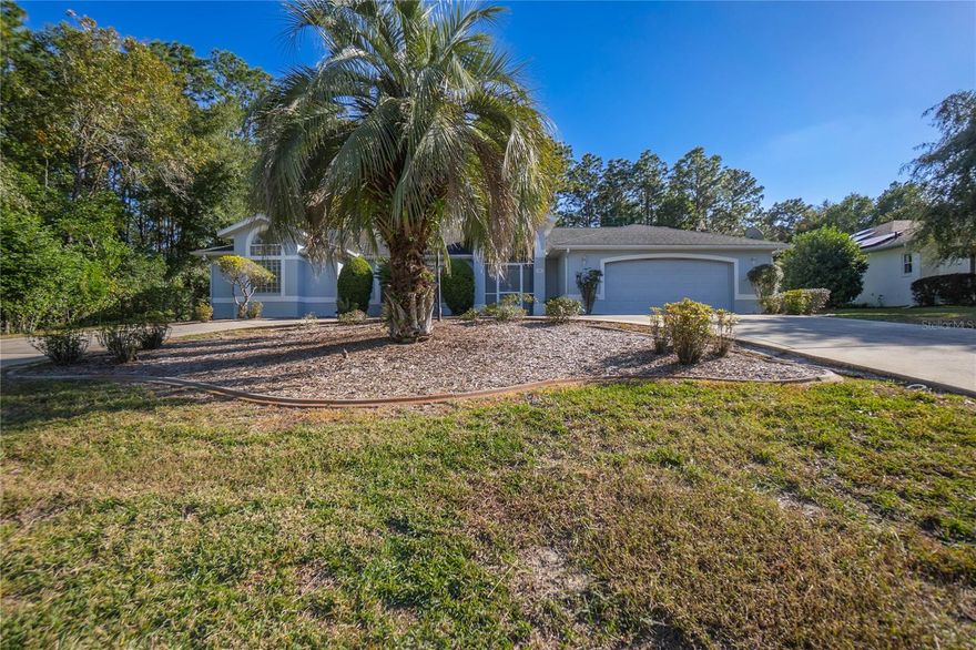 CHARMING CAMBRIDGE GREENS POOL HOME! Value packed 4/2/2 home with 2392 living area is tucked on a spacious 1/2-acre parcel for an affordable asking price of $370,000. This well-maintained home is ideal for entertaining or growing families. The interior features multiple living areas, including a formal living room, a cozy family room, and a spacious dining area with a breakfast nook, perfect for gatherings and everyday meals. In addition, the large kitchen offers abundant cabinetry, a breakfast bar & appliances, a convenient interior laundry, and a desirable split floor plan. The primary suite features a walk-in closet and a full bathroom with dual sinks, and sitting area offering a peaceful retreat, while three additional bedrooms provide plenty of space for family, guests, or a home office. The exterior presents an inground, screened pool and a covered lanai—perfect for outdoor dining, entertaining, a two-car garage, and circular driveway. This beautiful home has been lovingly cared for and offers the perfect blend of indoor and outdoor living.