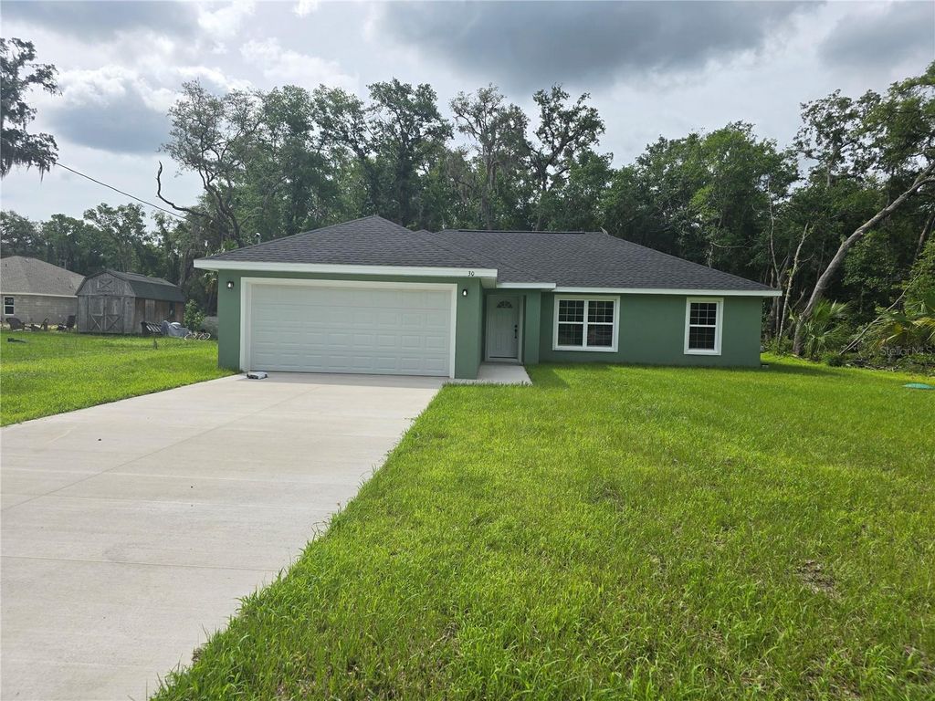 Photo of 30 Sequoia Drive Trace, Ocklawaha, FL 32179 (MLS # OM726232)