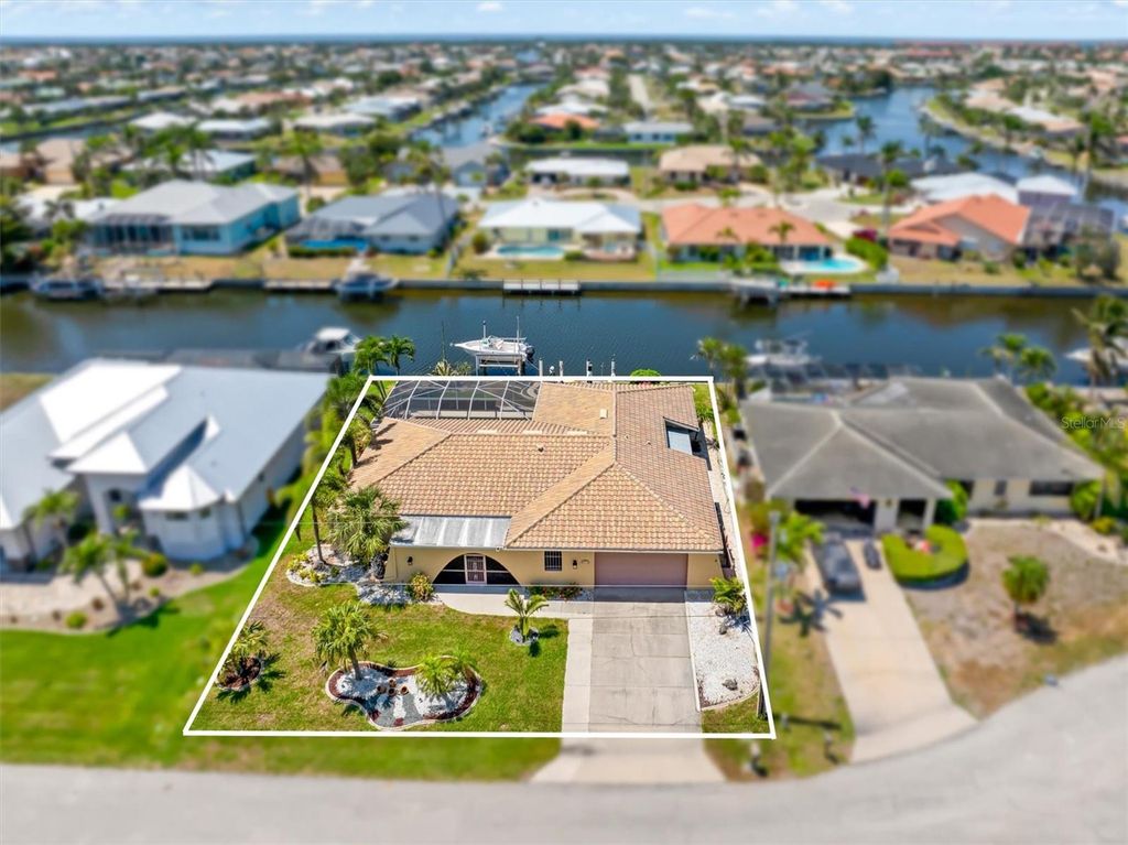 Photo of 931 Cimarron Drive, Punta Gorda, FL 33950 (MLS # C7508709)