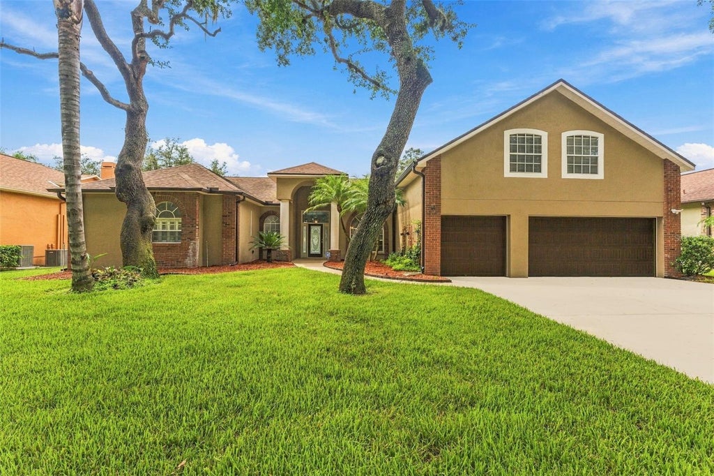 Photo of 2561 Regal River Road, Valrico, FL 33596 (MLS # TB8548907)