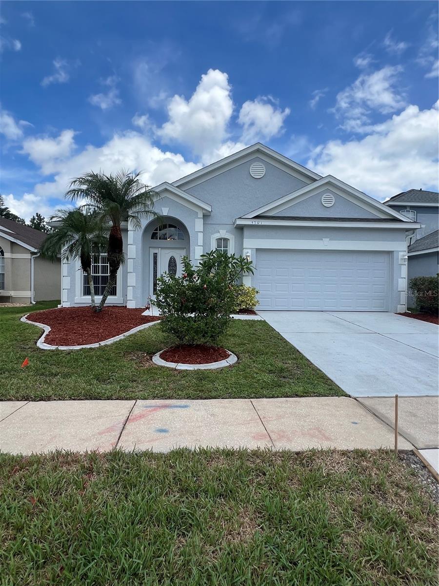 Welcome to this stunning single-story home located in the highly desirable Hunters Creek community. This spacious property offers an open floor plan, high ceilings, and a perfect blend of comfort and style. This property features 3 Bedrooms , 2 Bathrooms with spacious living and dining areas with tile floors throughout. It has a bright kitchen with plenty of counter space. The Master suite has a large walk-in closet, dual vanities, separate shower, and soaking tub. It has a separated laundry area inside the house with washer and dryer included and a two car garage with ample driveway space. This house has a large fenced backyard perfect for entertaining, relaxing, or family activities. Landscaping maintenance included in the rent. Close to shopping, dining, parks, top-rated schools and Easy access to major highways, theme parks, and Orlando International Airport