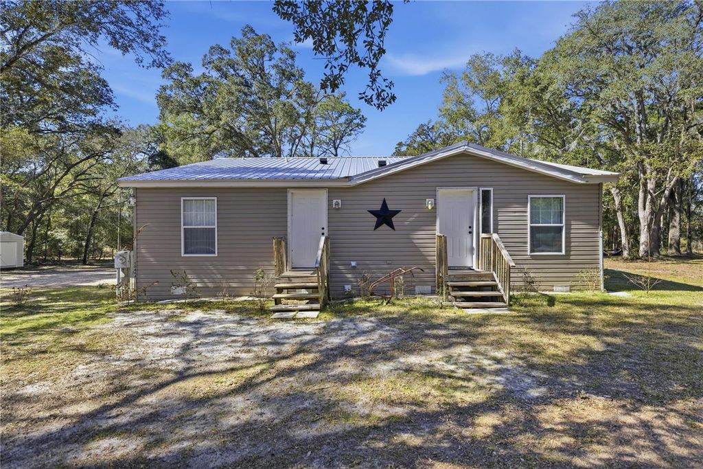 Photo of 10484 N Burgundy Point, Dunnellon, FL 34433 (MLS # OM718547)