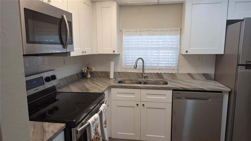Photo of 809 Russell Lane #323, Brandon, FL 33510 (MLS # A4703309)