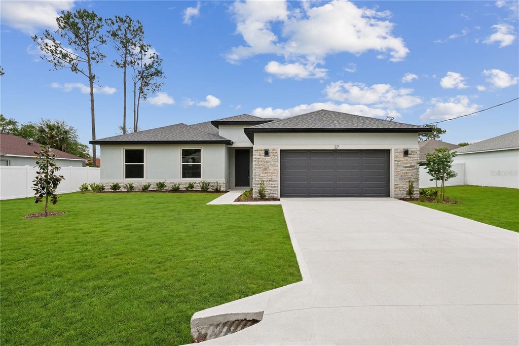 Photo of 21 Bonnie Lane, Palm Coast, FL 32137 (MLS # FC321255)