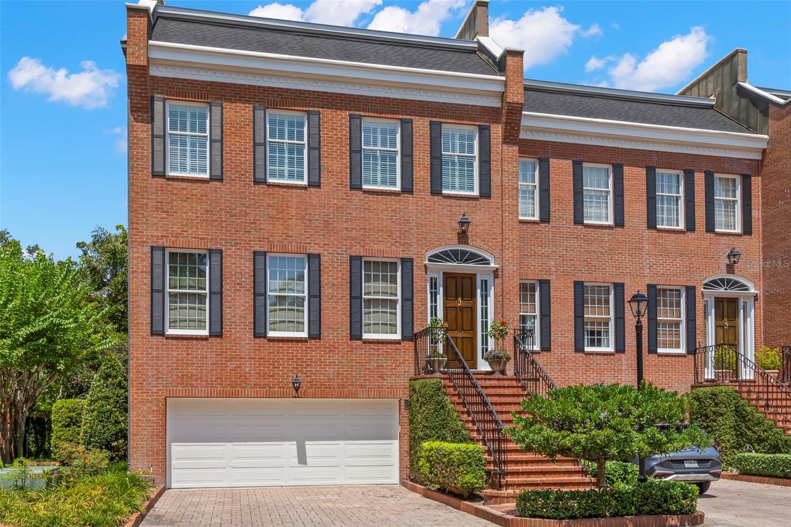 Welcome to the rarely available, private community of Crescent Place! This 4-bedroom, 3.5-bathroom townhome exudes elegance & Georgian architecture while nestled in the beloved Ballast Point neighborhood. Crescent Place is a highly desired community with only 20 residences surrounded by a stately brick wall for ultimate privacy and steps away from the Tampa Yacht & Country Club, Ballast Point Park, and Bayshore Boulevard. Boasting 3,749 SF, this end unit underwent a gut renovation in 2015, blending sophisticated style with functional living spaces while enhancing the character of the home. This 3-story unit is equipped with an elevator for complete convenience to all levels. The main living area, located on the second level, welcomes you into the home with a formal living & dining room and opens up to the family room. The family room features Venetian plaster walls, custom built-ins & built-in desk plus a wood-burning fireplace. The family room overlooks the eat-in chef's kitchen, which features top-of-the-line appliances, including double Wolf ovens, marble countertops, Moroccan subway tile backsplash, carefully constructed custom cabinets to utilize optimal storage space & a walk-in pantry. Sliding glass doors off the kitchen lead out onto the covered balcony overlooking the serene courtyard. On the 3rd level, you will find the spacious primary suite with 2 walk-in closets, a stunning bathroom with dual sinks, a soaking tub & walk-in shower, plus 2 additional bedrooms with a center hall bath & laundry area. The first-floor renovation was completed in January 2025 by Daley Construction with endless options for use. This multi-functional first-floor club room functions as a 4th bedroom with a built-in Murphy bed, a full bathroom with a walk-in shower, a large walk-in cedar closet, & a kitchenette/bar. Enjoy relaxing or alfresco dining in your private courtyard, which wraps around the side of the unit, providing additional backyard space. Additional upgrades include: Roof installed November 2024, upstairs AC replaced June 2025, & flood barrier installed at the gate, as well as backflow preventers in September 2025. 2-car garage with electric charging port & additional storage area. Minutes to Hyde Park, Soho, Downtown, TIA, International Mall, wonderful restaurants, shopping, and the Gulf beaches.